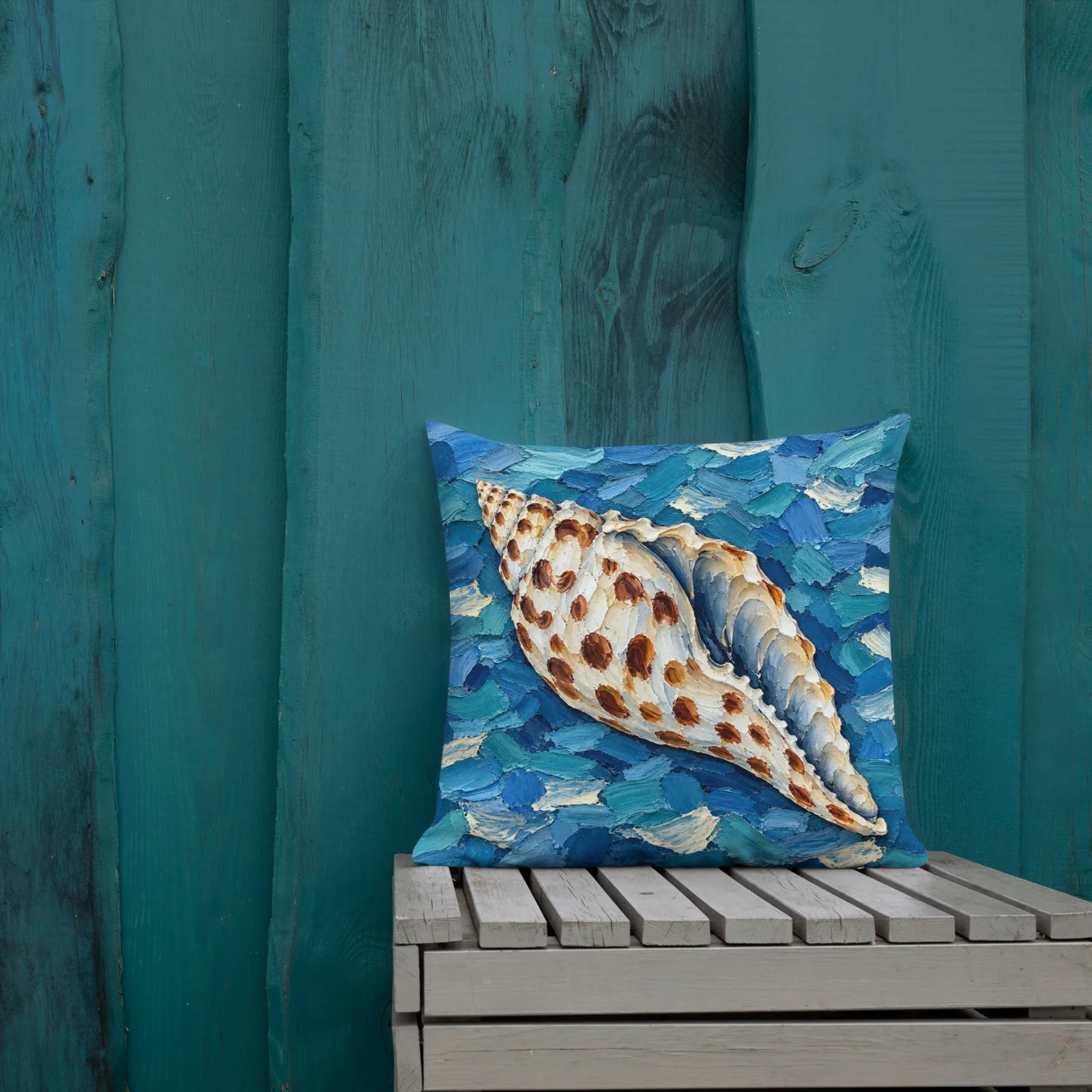 Junonia Seashell Throw Pillow: Spotted Shell Impasto Blue Coastal Decor Cushion, outdoors lifestyle front 1 view